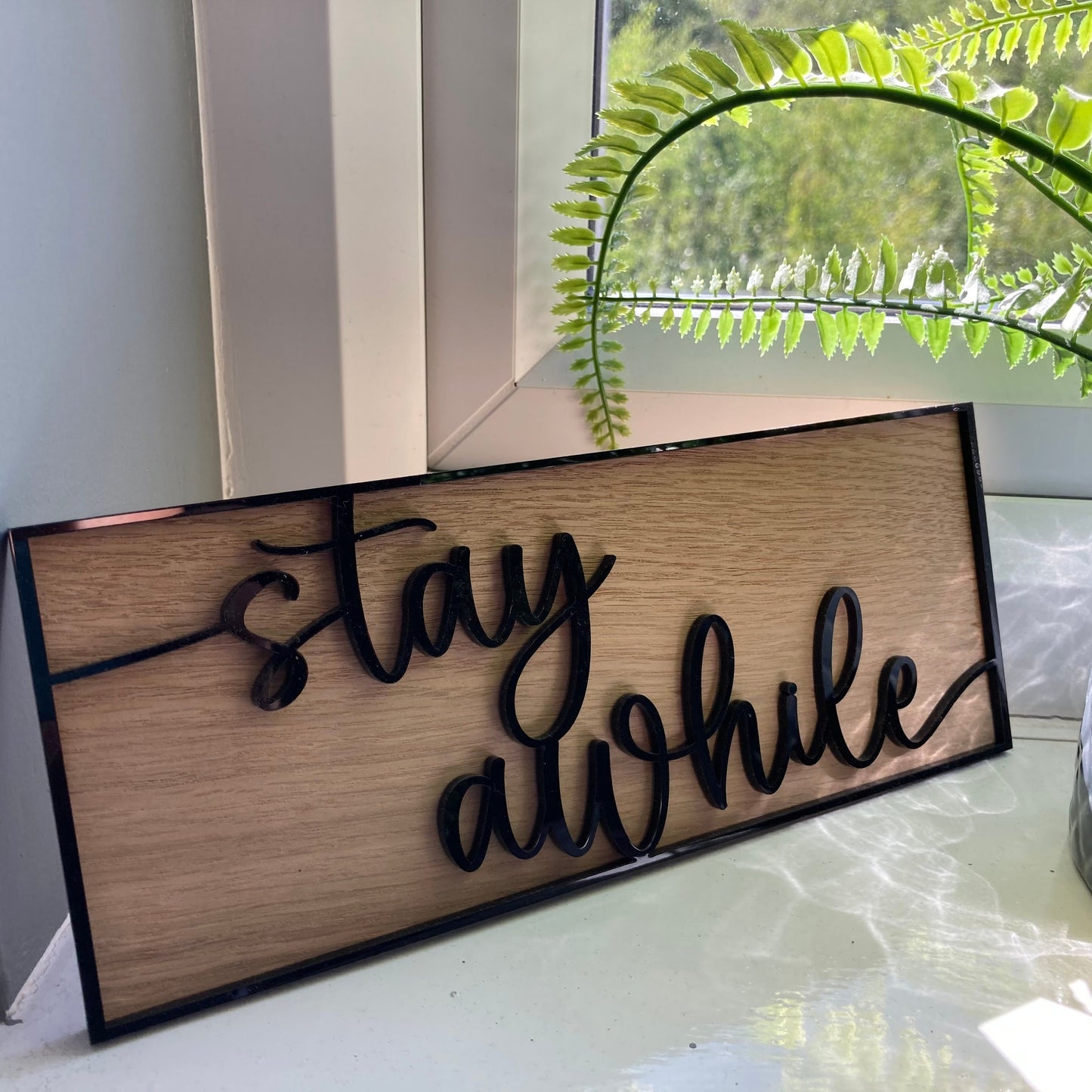 Stay a while Sign