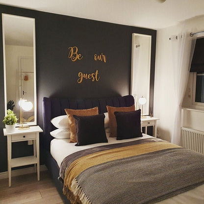 Wooden Be Our Guest wall art