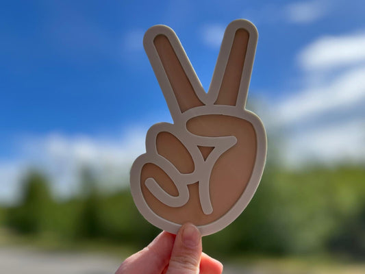 Peace hand gesture
